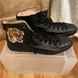 Gucci high tops. No longer sold. Worn once or twice.
